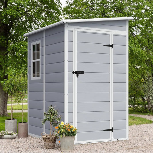 Outdoor 5x4 FT resin storage shed with lockable door and heavy-duty floor in backyard setting