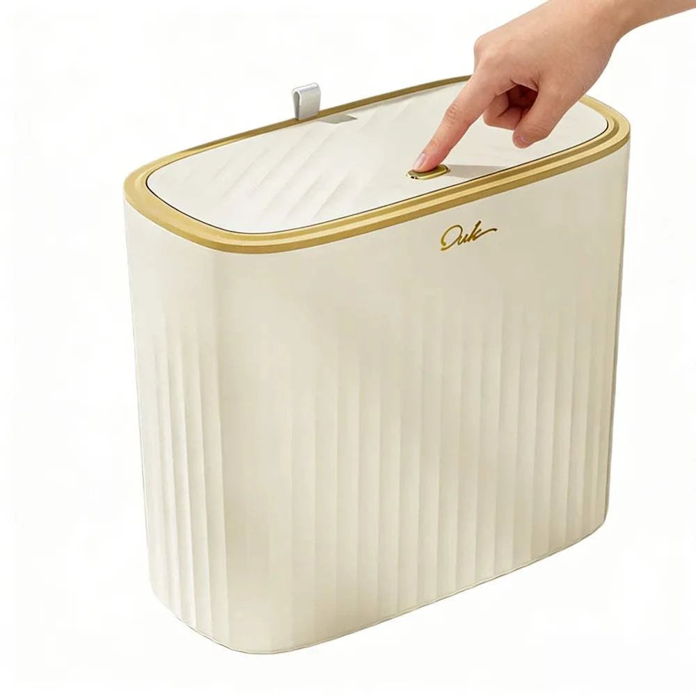 Beige gold trim slim rectangular trash can with press-to-open lid for bathroom and kitchen space-saving use