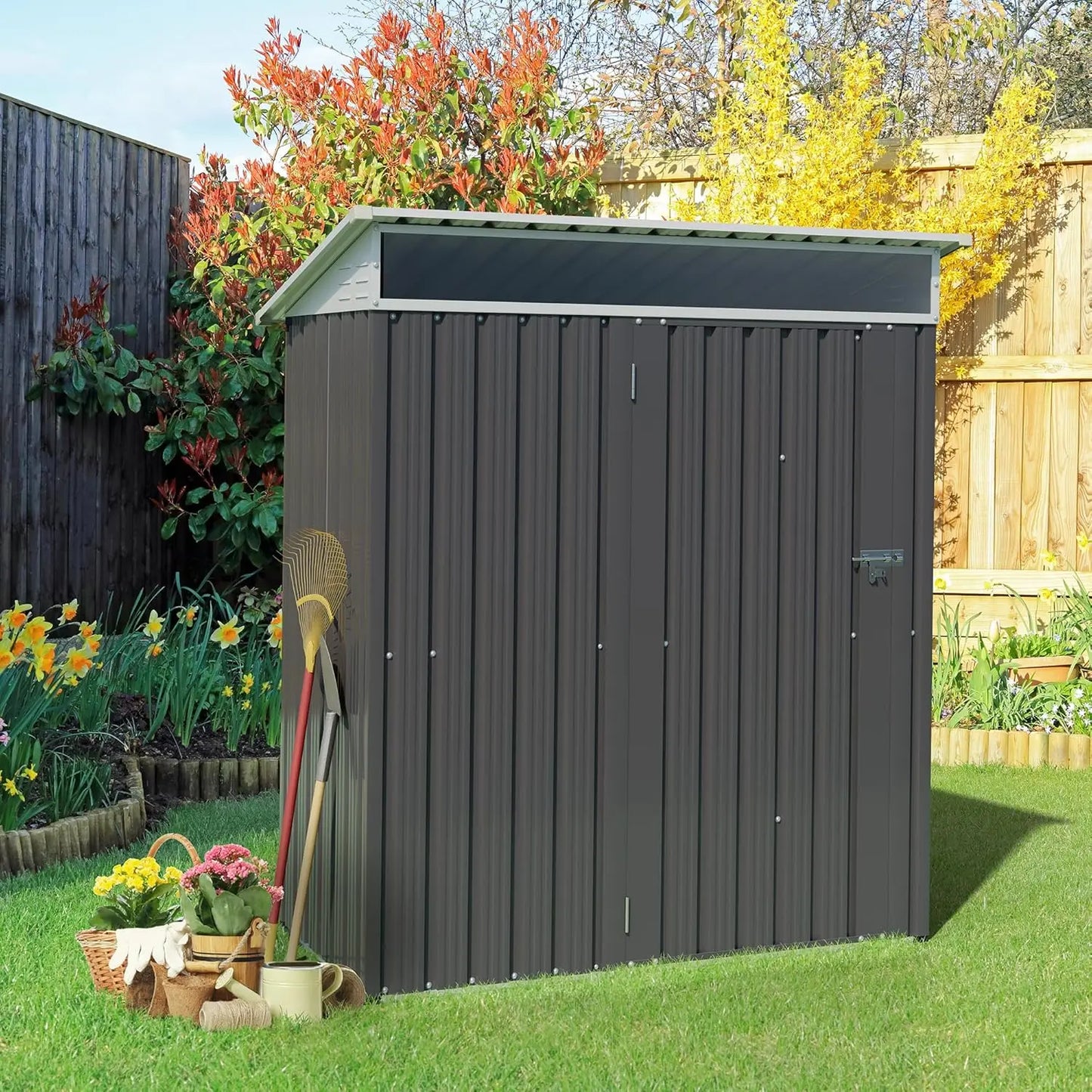 Outdoor metal storage shed with side window and lockable door