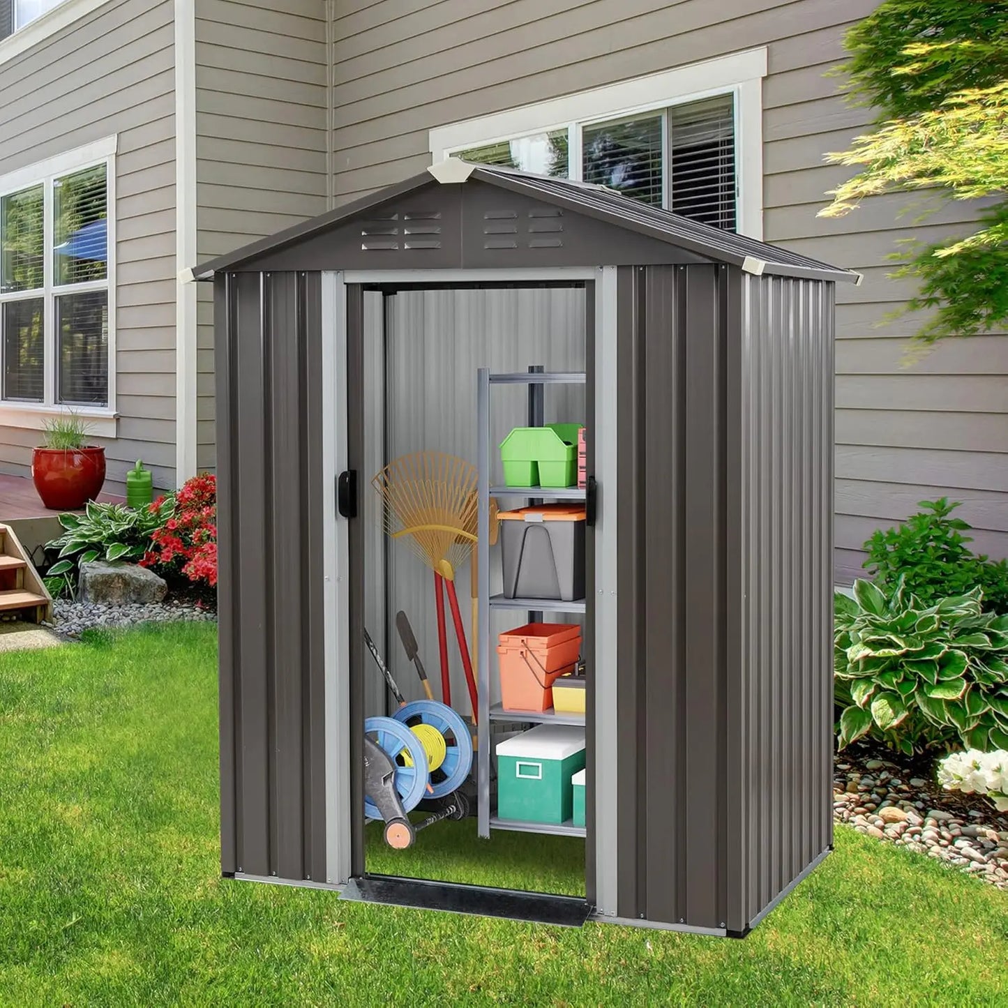 Outdoor metal storage shed with side window and lockable door for secure outdoor storage